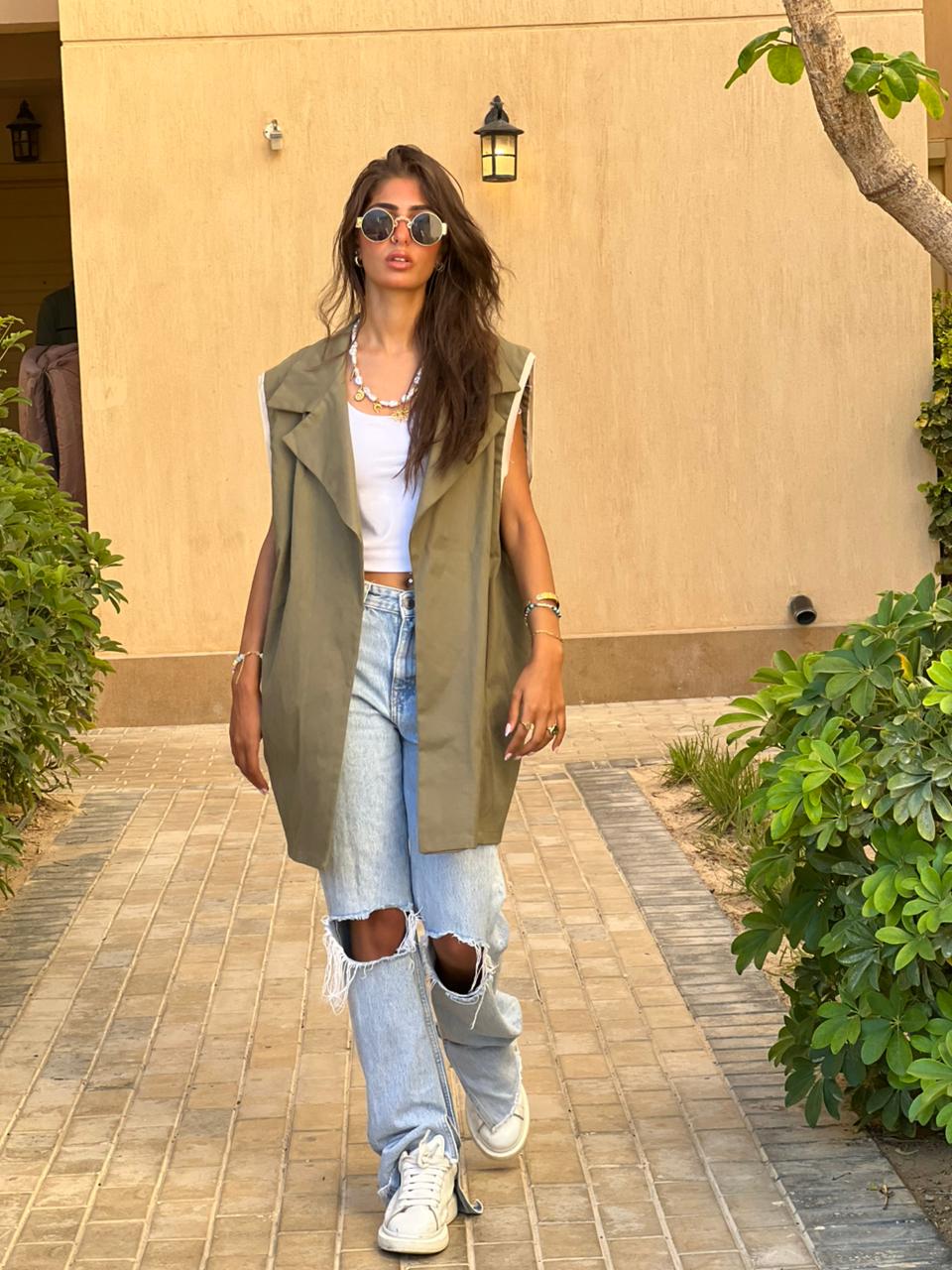 Gabardine vest with studded belt