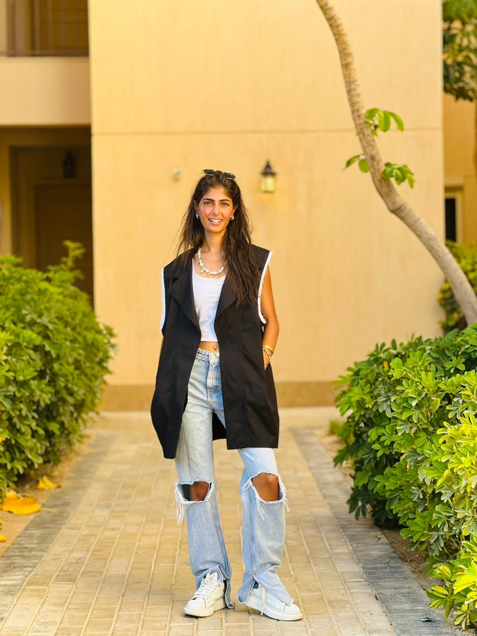 Gabardine vest with studded belt