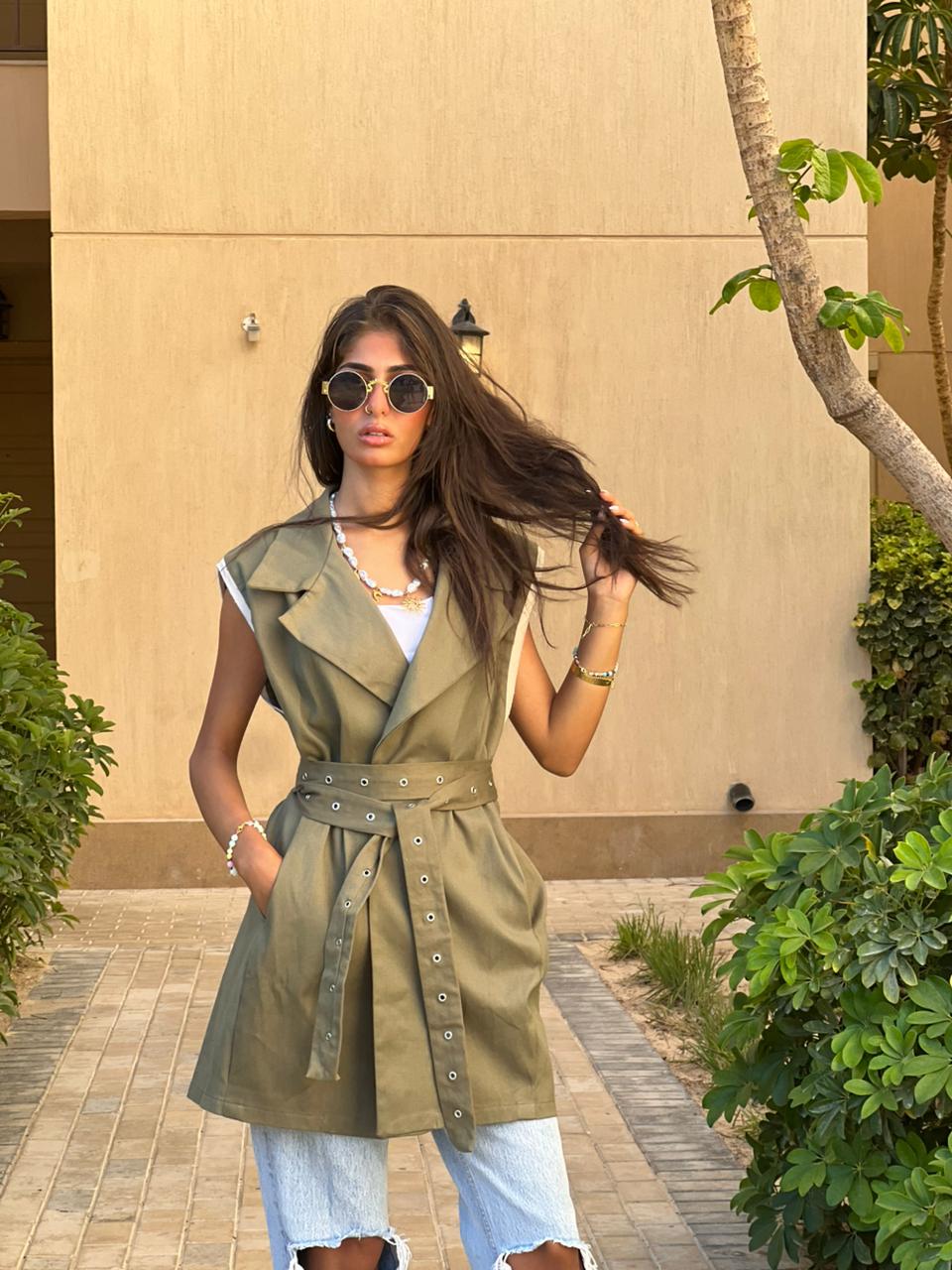 Gabardine vest with studded belt