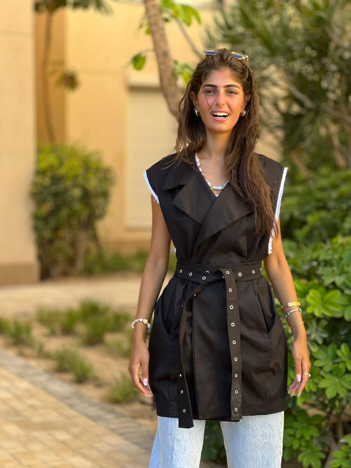 Gabardine vest with studded belt